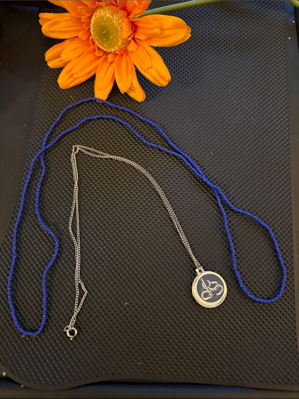 Two Necklaces - Silver Pendant Necklace and a Blue Beaded Chain